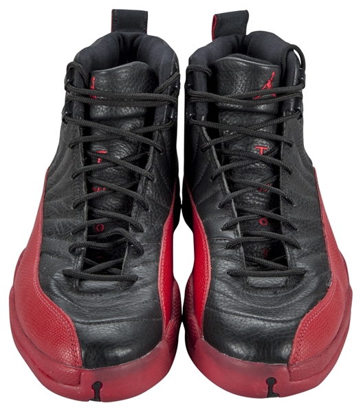 Sneakers worn by NBA legend Michael Jordan in 1997 'Flu Game' fetches $1.38  mn at NY auction - The Economic Times