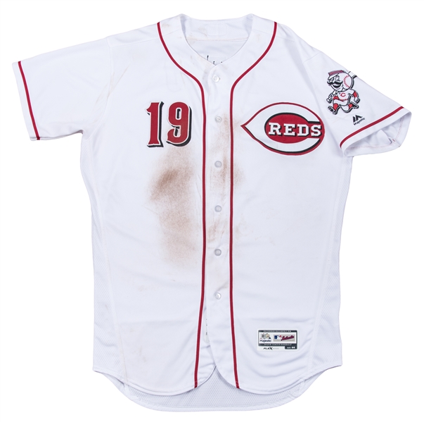 The Mr. Redlegs logo is seen on the jersey of Joey Votto during a baseball  game