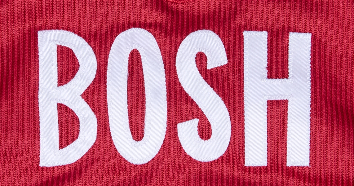 2003-04 Upper Deck Rookie Exclusives Jersey #J4 Chris Bosh Toronto Raptors  Card
