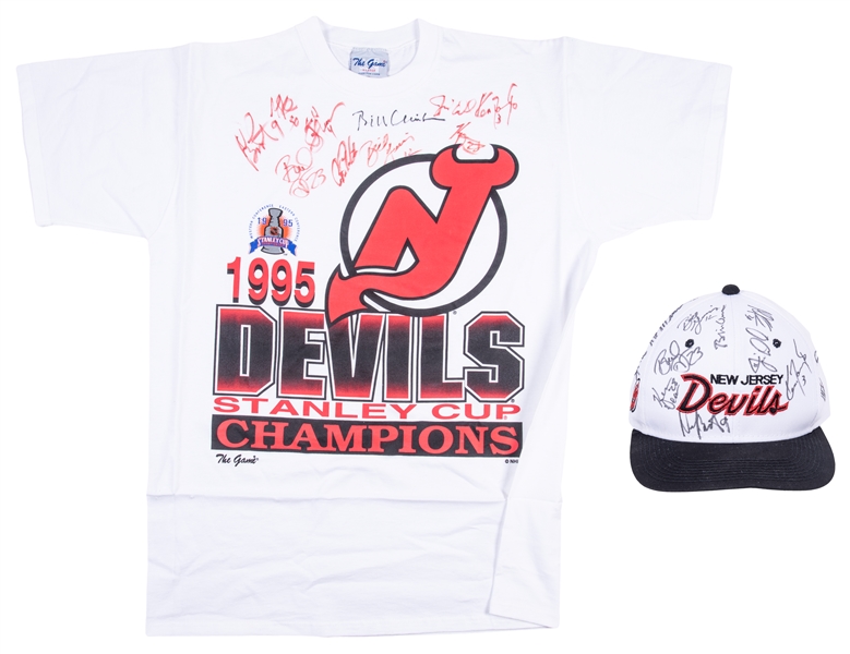 1995 Stanley Cup Champion New Jersey Devils Team Signed T-Shirt & Hat With 20 Signatures Including President Bill Clinton & More! (Beckett Pre-Cert)